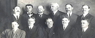 Group image of men who were members of the Honorary Economic Epicureans group